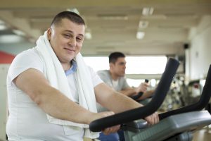 Overweight Man Exercising