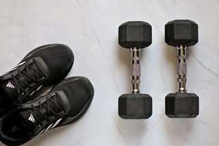 Tennis shoes and dumbbell weights